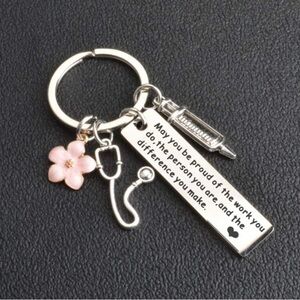 Silver (w/ pink accessories) keychain for nurse/healthcare worker appreciation